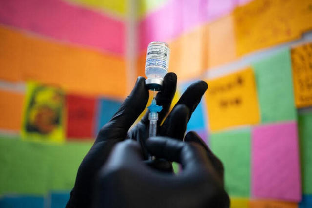 Indonesia approves first home-grown COVID vaccine for emergency use